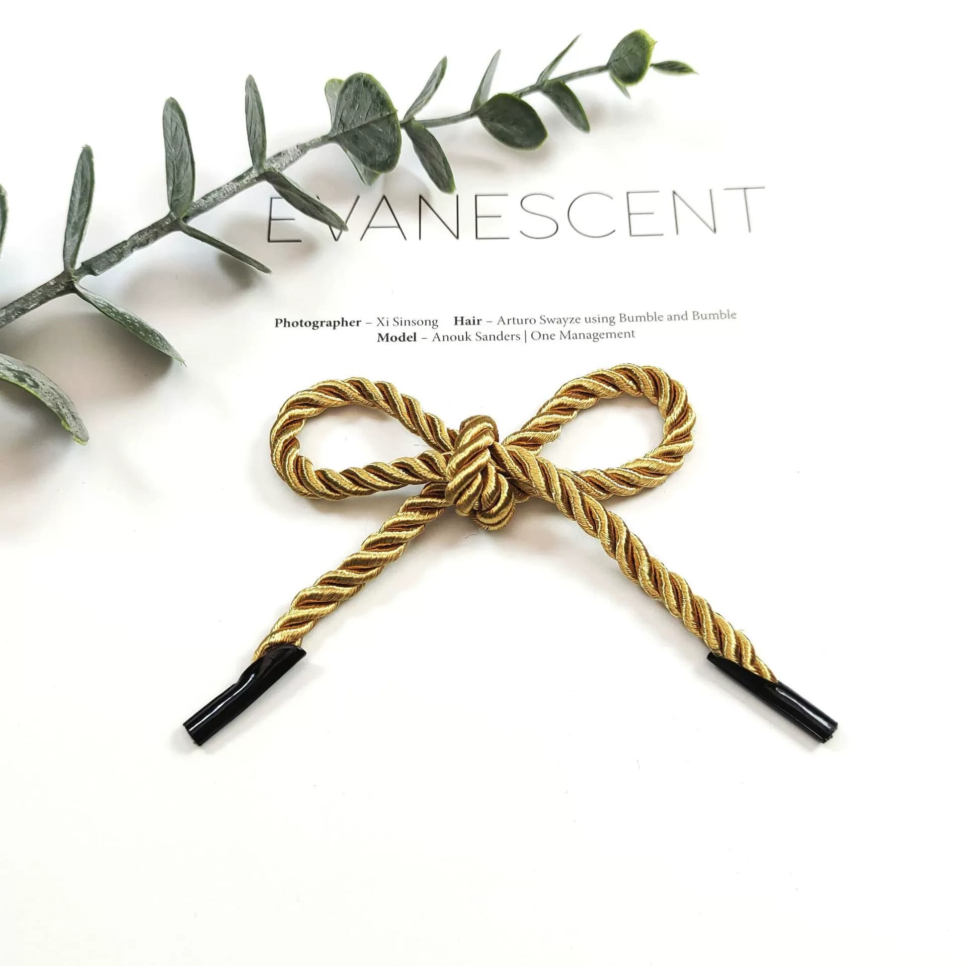 Glossy Core-Wrapped Three-Strand Twisted Cord