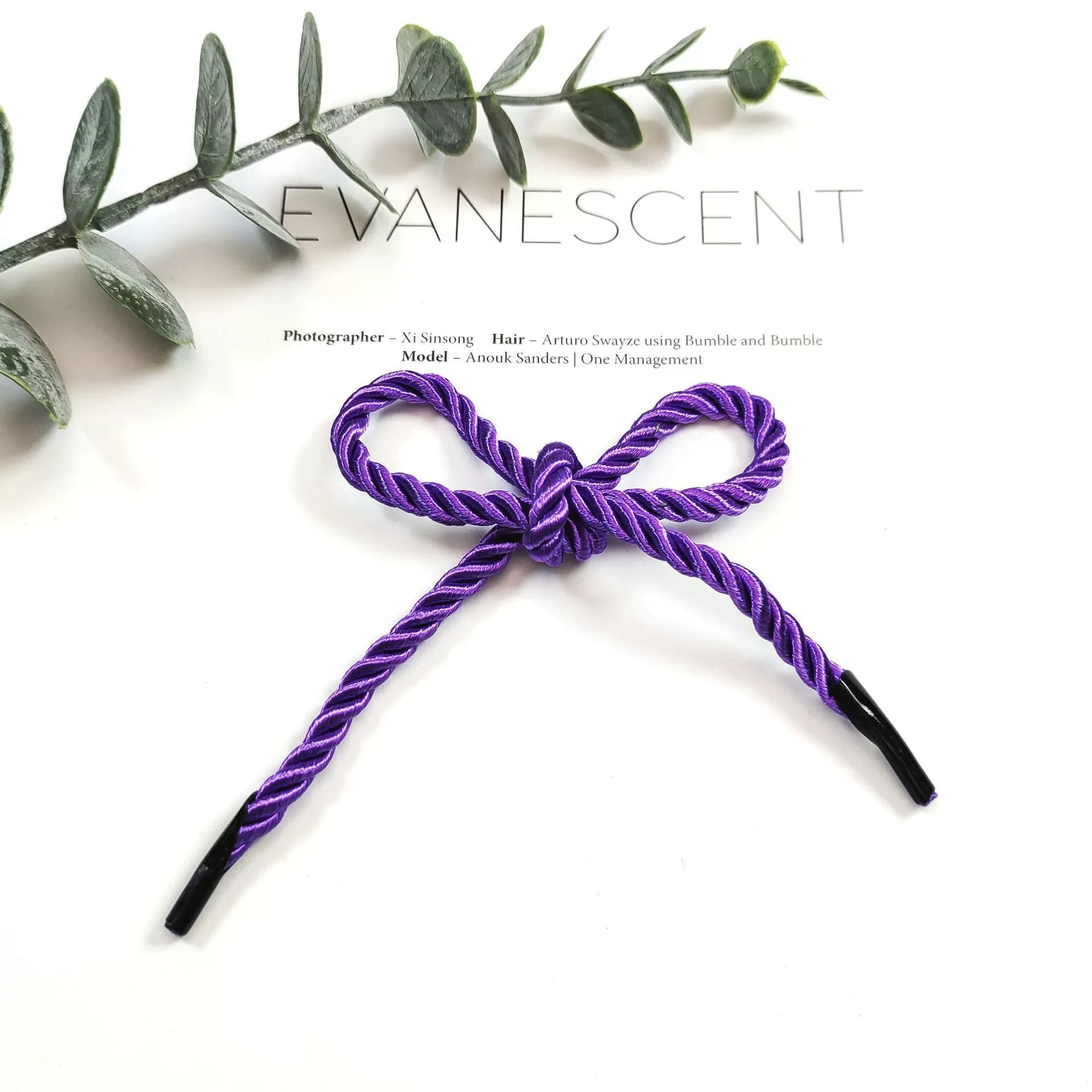 Glossy Core-Wrapped Three-Strand Twisted Cord